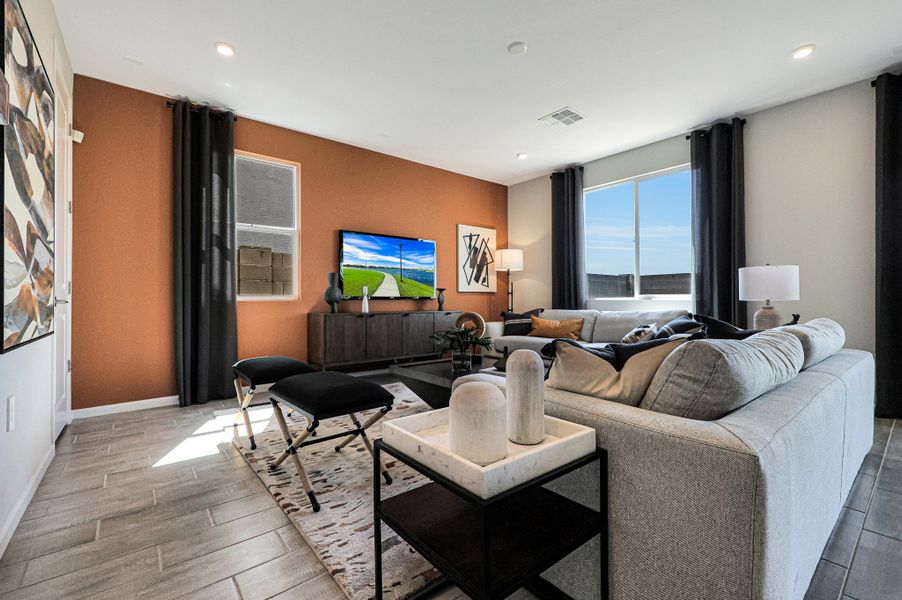 A living room with a large tv. A living room with a large tv.