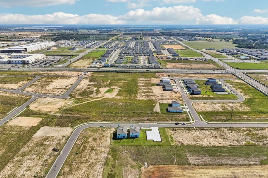 An aerial view of a parking lot.