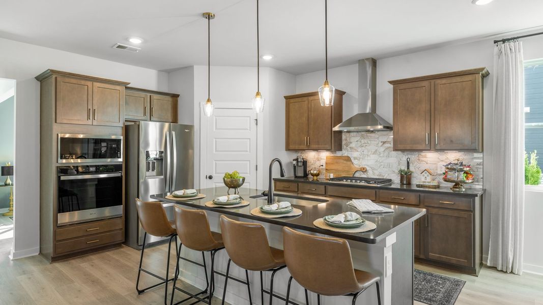 Furnished interior in a model home at Harvest Point in Spring Hill (Image 5).