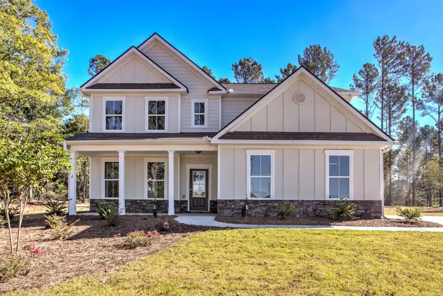 Front exterior of a home in the Legends at Old Monroe community, located in Monroe, GA (Image 3).