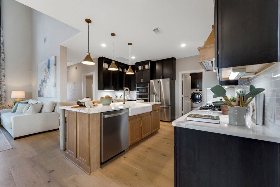 Furnished interior in a model home at Sunterra Lakes in Brookshire (Image 22).