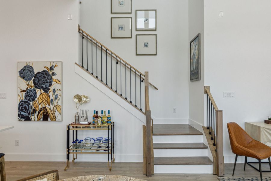 Furnished interior in a model home at Newman Village Townhomes in Frisco (Image 24).