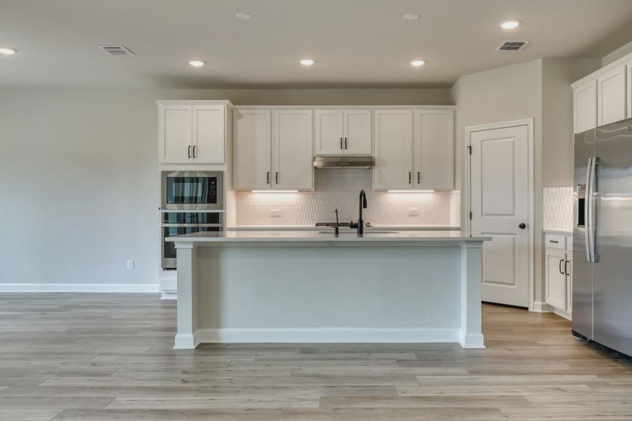 Furnished interior in a model home at Cordova Trails in Seguin (Image 20).