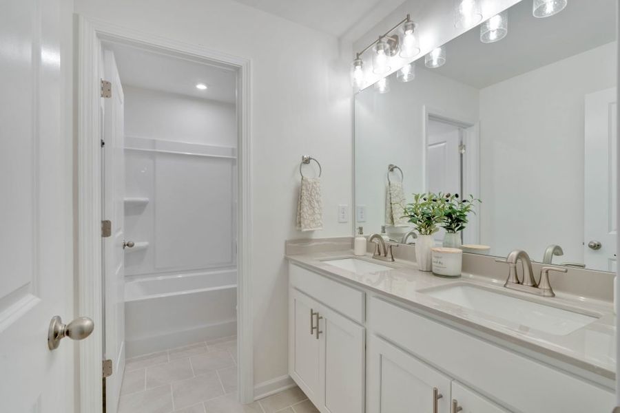 Furnished interior in a model home at Meadow Pines in Dallas (Image 33).