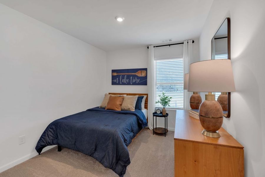 Furnished interior in a model home at Village Green in Adairsville (Image 17). Furnished interior in a model home at Village Green in Adairsville (Image 17).