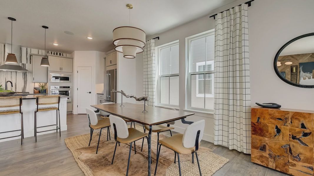 Furnished interior in a model home at Westerly in Erie (Image 7).