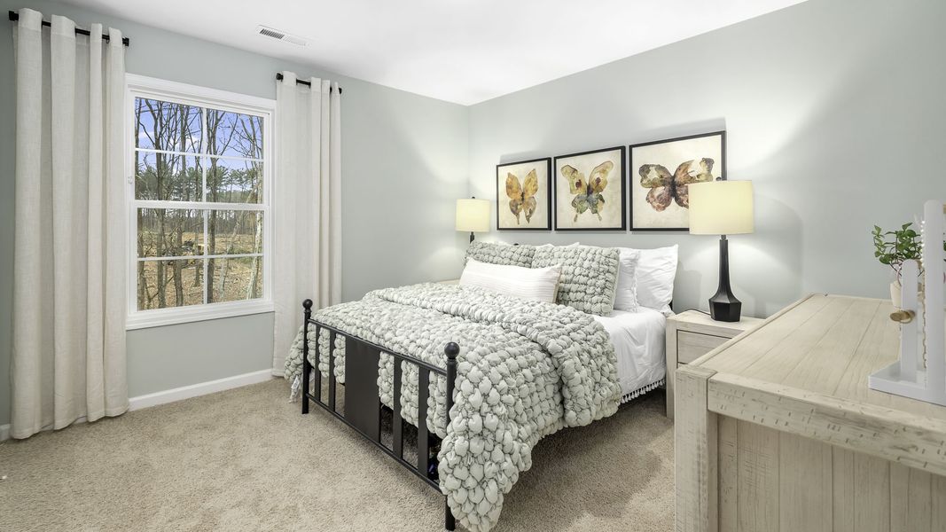 Furnished interior in a model home at Lybrook Village in Bermuda Run (Image 29).