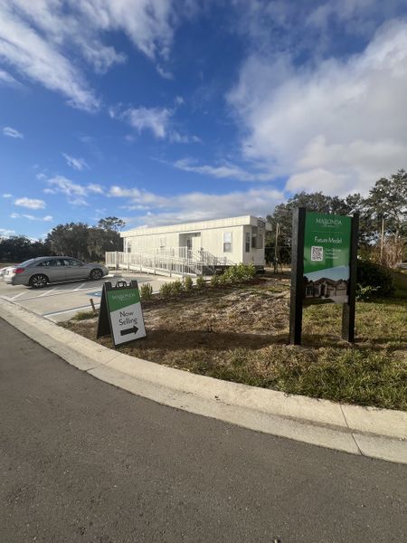 A future model site in Magnolia Estates by Maronda Homes, featuring spacious parking in Lakeland, FL.