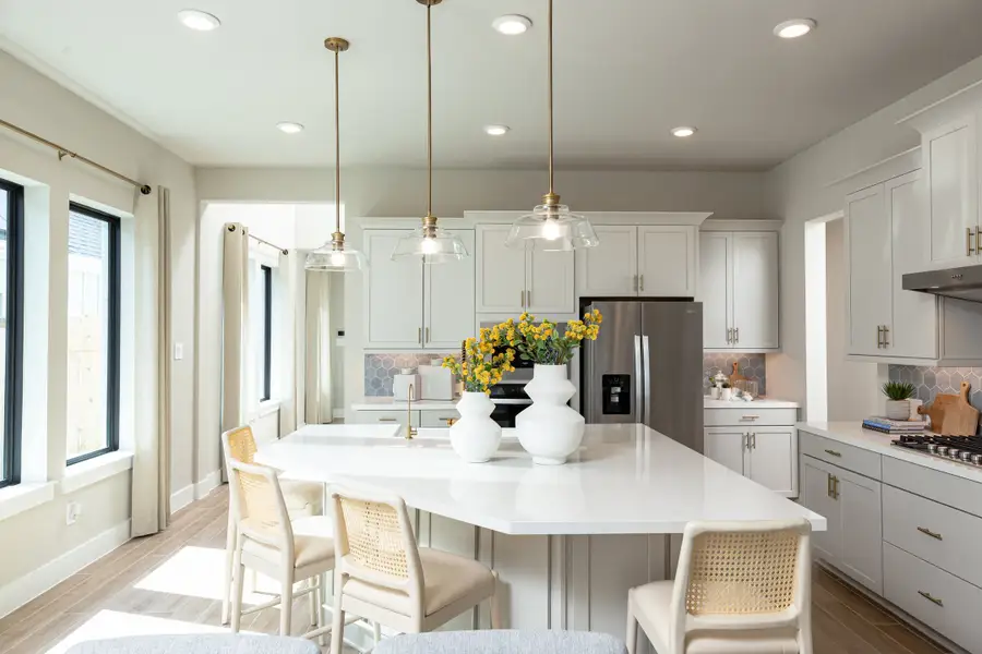 Furnished interior in a model home at The Highlands in Porter (Image 3).
