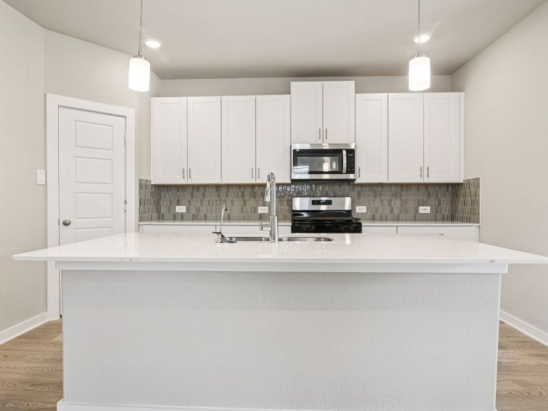 Furnished interior in a model home at Massey Oaks - Estate Series in Pearland (Image 7).