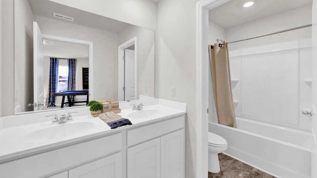 Furnished interior in a model home at Sweet Briar in Ooltewah (Image 41). Furnished interior in a model home at Sweet Briar in Ooltewah (Image 41).