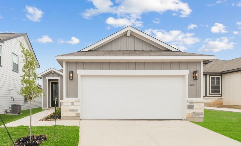 Front exterior of a home in the Veranda Designer community, located in San Antonio, TX (Image 23).