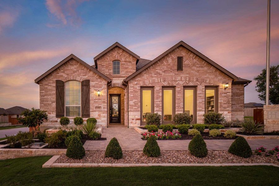 Front exterior of a home in the Crosswinds: 60ft. lots community, located in Kyle, TX (Image 7).