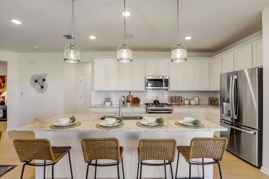 Furnished interior in a model home at Village at Three Oaks in Seguin (Image 16).