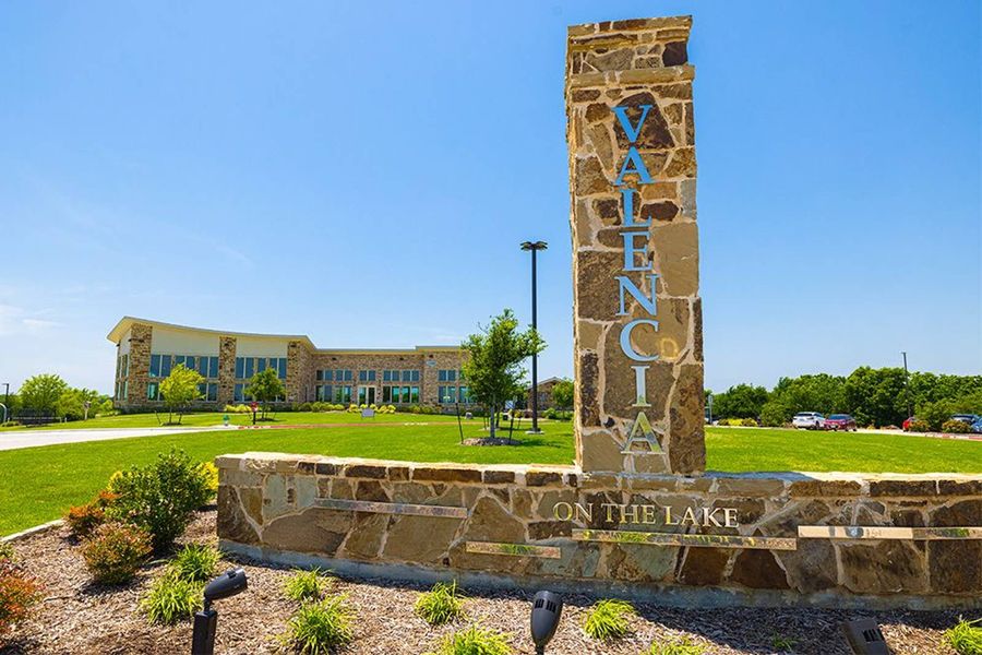 Entrance to the Valencia on The Lake community in Little Elm, TX, featuring signage and landscaping (Image 4).
