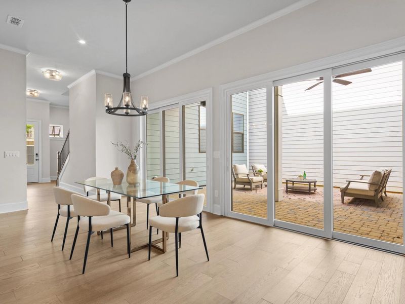 Furnished interior in a model home at The Village at Towne Lake in Woodstock (Image 9).