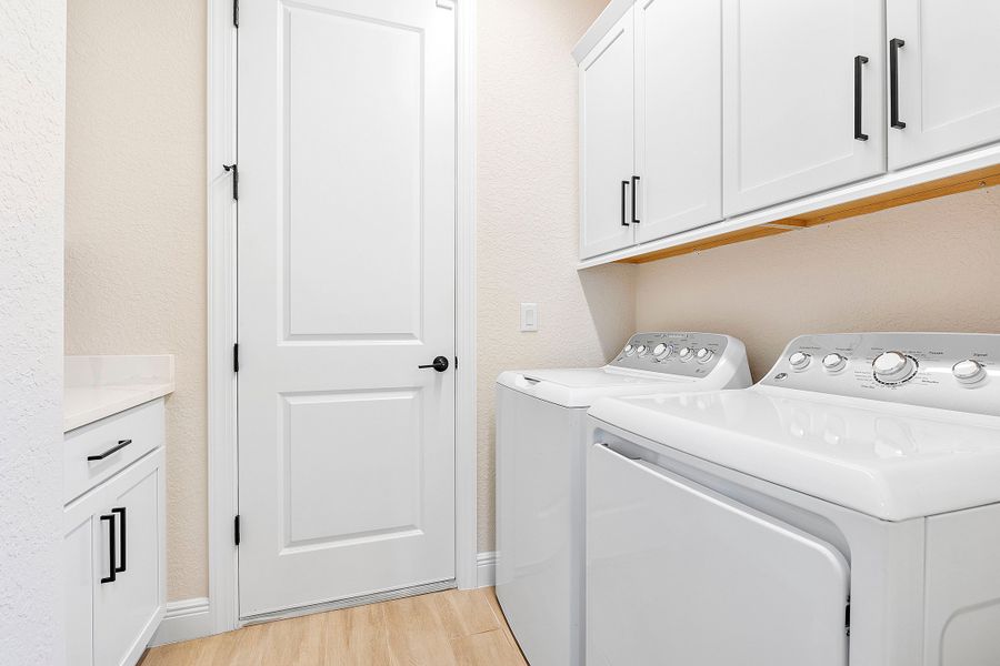 Furnished interior in a model home at The Sanctuary – Resort Collection in Punta Gorda (Image 28).