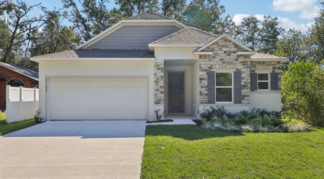 Front exterior of a home in the Cassie Oaks community, located in Jacksonville, FL (Image 9).
