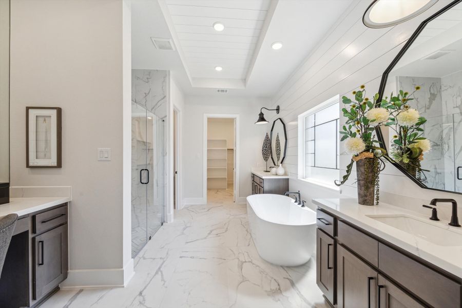 Furnished interior in a model home at The Woodlands Hills – 65' in Willis (Image 17).