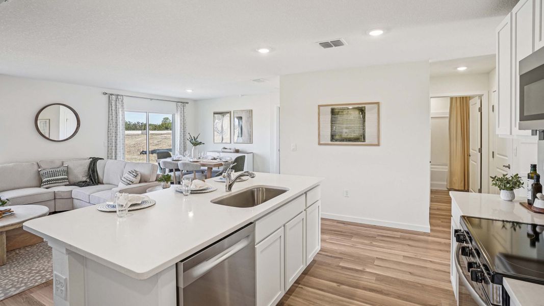 Furnished interior in a model home at Fletcher Trace in Alachua (Image 6).