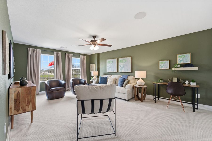 Furnished interior in a model home at Infinity Square in Kyle (Image 36).