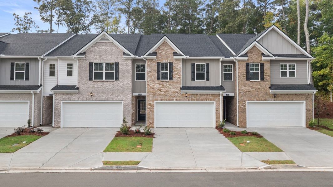 Front exterior of a home in the Independence Villas and Townhomes community, located in Loganville, GA (Image 11).