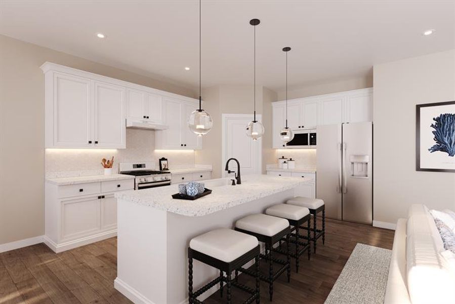 A bright, open kitchen with generous island seating—perfect for gathering, cooking, and hosting. A bright, open kitchen with generous island seating—perfect for gathering, cooking, and hosting.