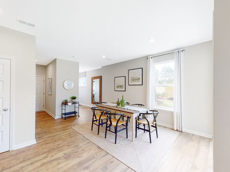 Furnished interior in a model home at Friendship Village Townes in Apex (Image 3).