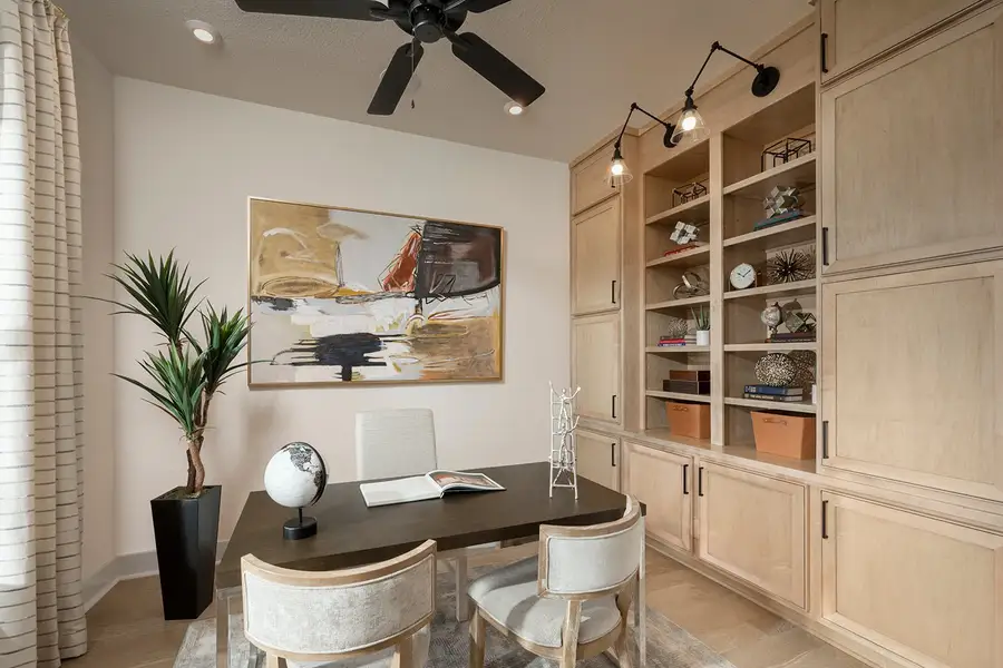 Furnished interior in a model home at 6 Creeks in Kyle (Image 24).