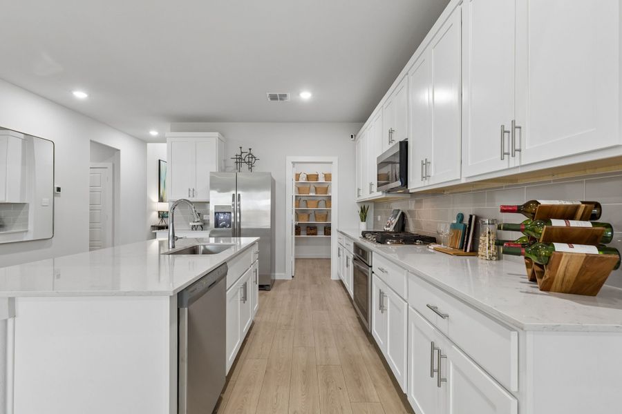 Kitchen in a Madero New Winters Model in Haslet TX by Trophy Signature Homes