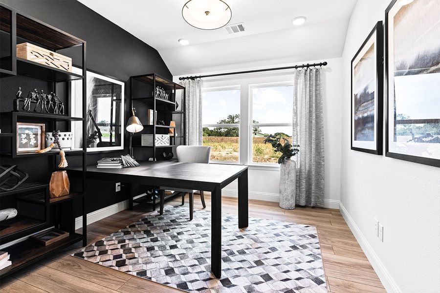 Furnished interior in a model home at Keeneland in Aubrey (Image 13). Furnished interior in a model home at Keeneland in Aubrey (Image 13).