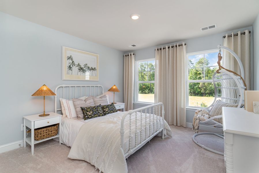 Furnished interior in a model home at Waterbridge in Myrtle Beach (Image 77).