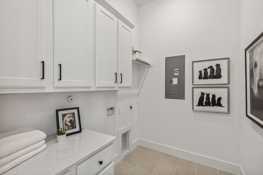 Furnished interior in a model home at Newman Village Townhomes in Frisco (Image 29).
