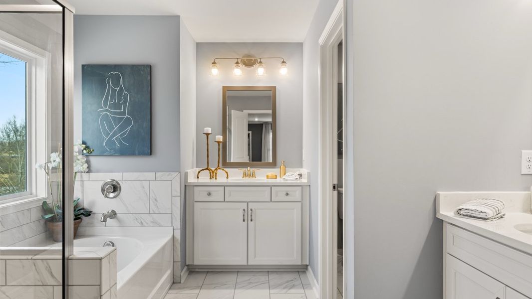 Furnished interior in a model home at Thalley Creek Estates in Cumming (Image 22).