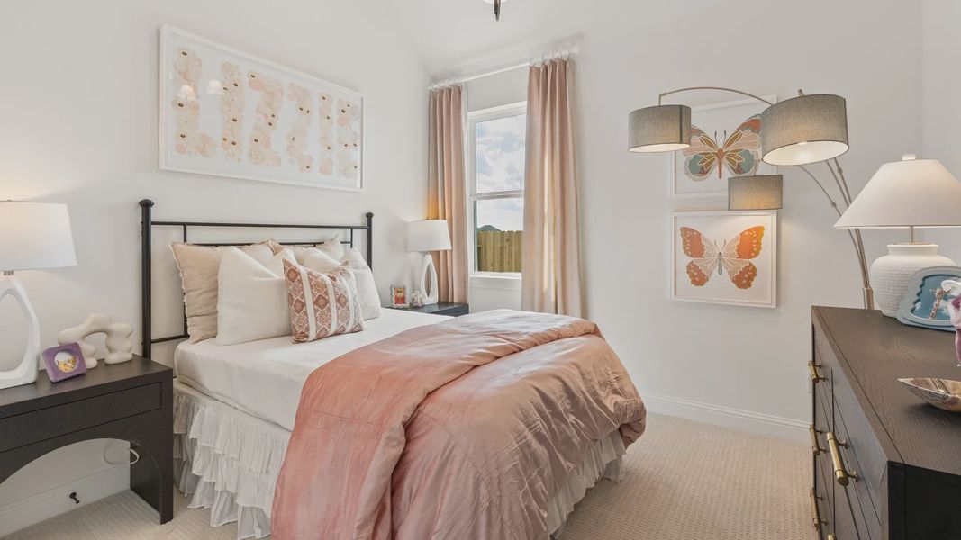 Discover serene elegance with plush bedding, modern lighting, and sleek furnishings in River Ranch.