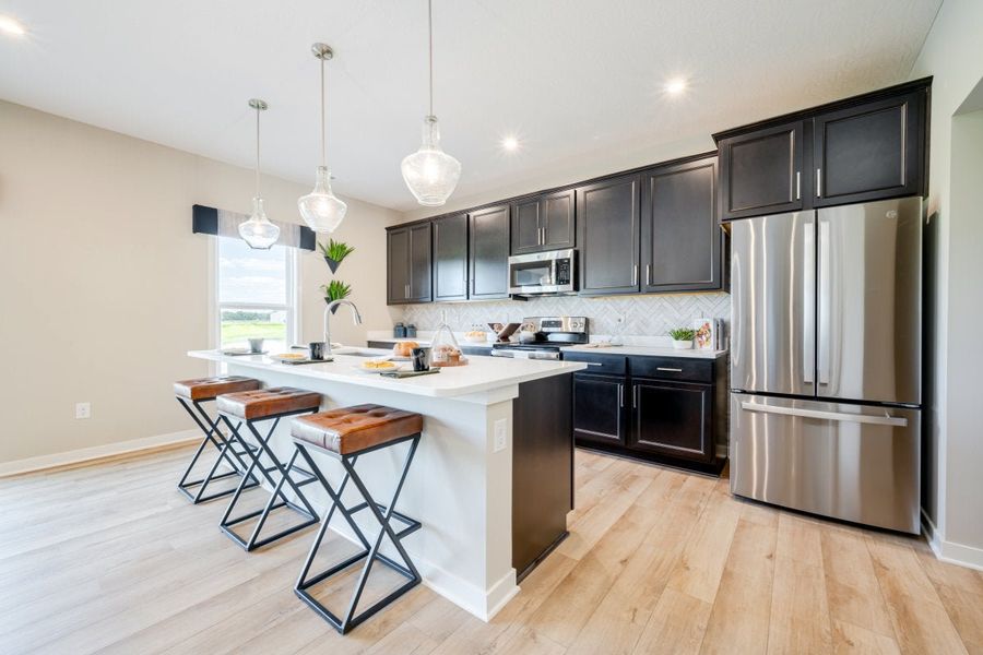 Furnished interior in a model home at Bridle Run in Louisville (Image 7).