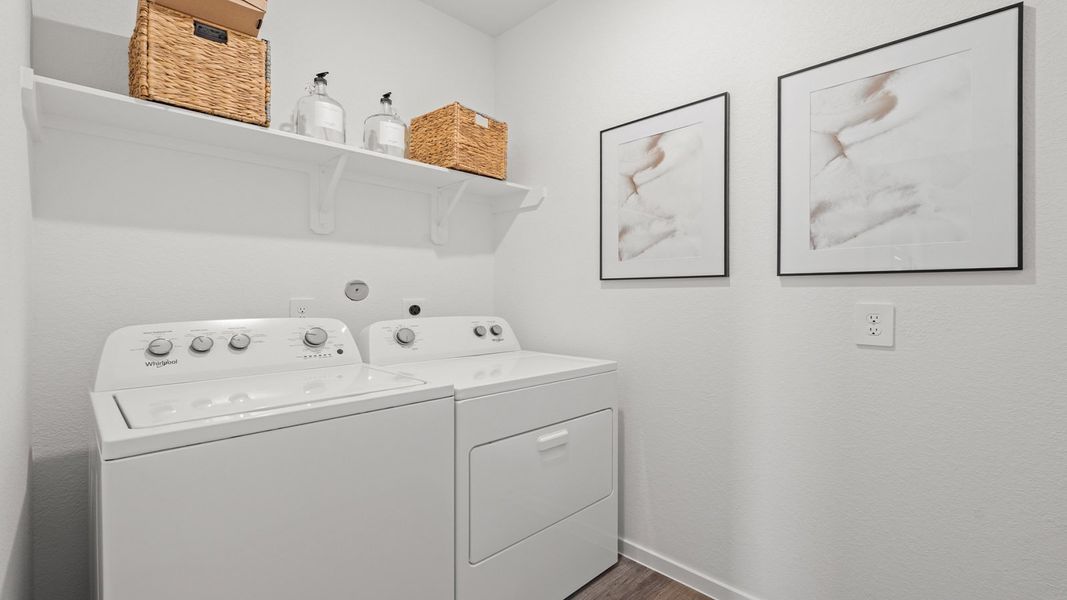 Furnished interior in a model home at Sunterra Lakes in Brookshire (Image 26).