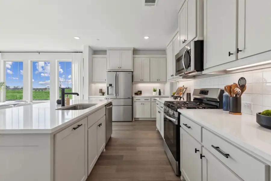 Furnished interior in a model home at The Village at Midtowne in Midlothian (Image 8).
