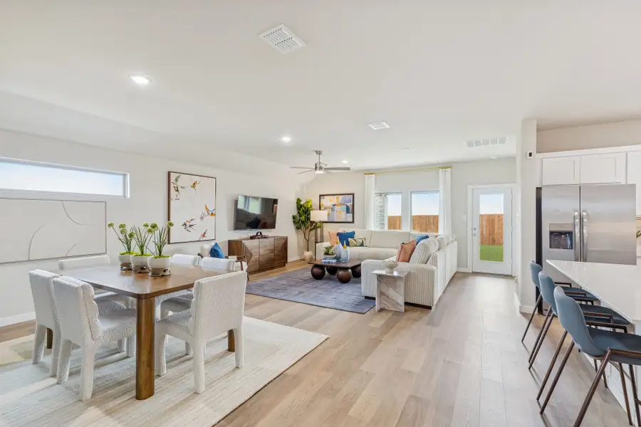 Living Area in the Hayden home plan by Trophy Signature Homes - REPRESENTATIVE PHOTO