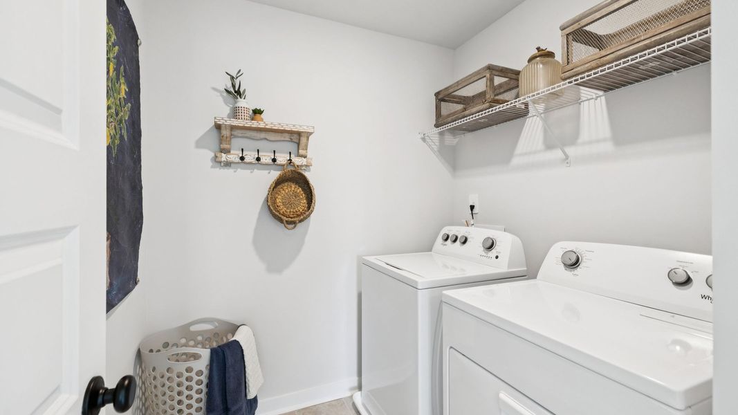 Furnished interior in a model home at Harvest Point in Spring Hill (Image 81).