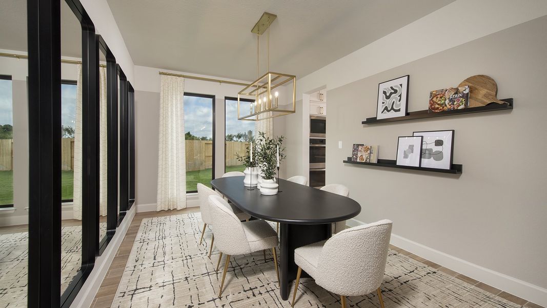 Furnished interior in a model home at Cross Creek West 55' in Fulshear (Image 16).