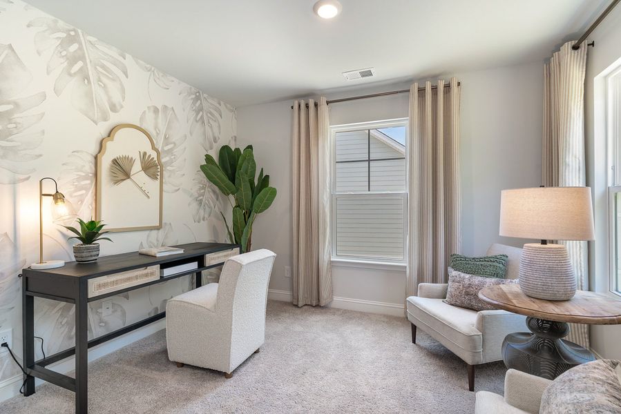 Furnished interior in a model home at Waterbridge in Myrtle Beach (Image 49).