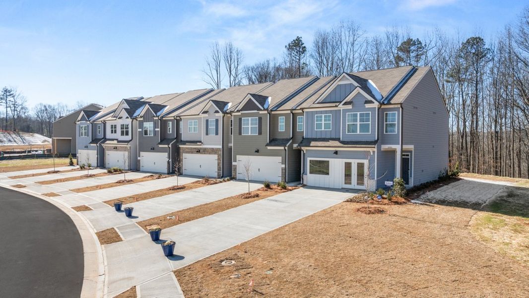 Front exterior of a home in the Oconee Overlook Townhomes community, located in Gainesville, GA (Image 2).