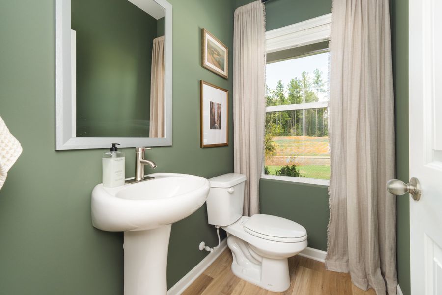 Furnished interior in a model home at The Bluffs At Carey Station in Greensboro (Image 20).