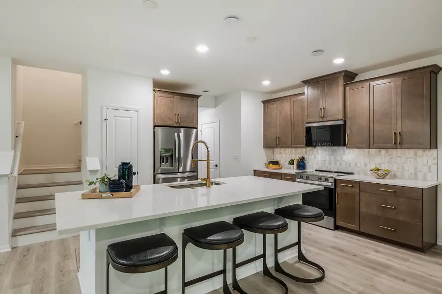 Furnished interior in a model home at Towns at Greenleaf in Oviedo (Image 3).