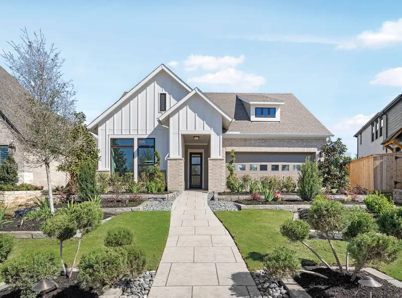 Front exterior of a home in the Kresston - Enclave Collection community, located in Montgomery, TX (Image 3).