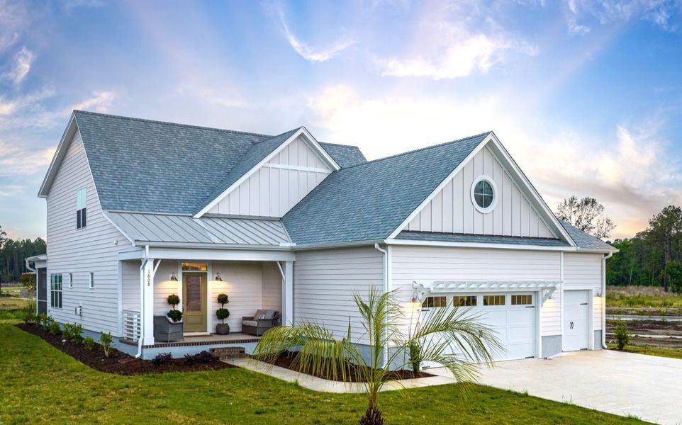 Front exterior of a home in the The Sanctuary at Sunset Beach community, located in Sunset Beach, NC (Image 11).