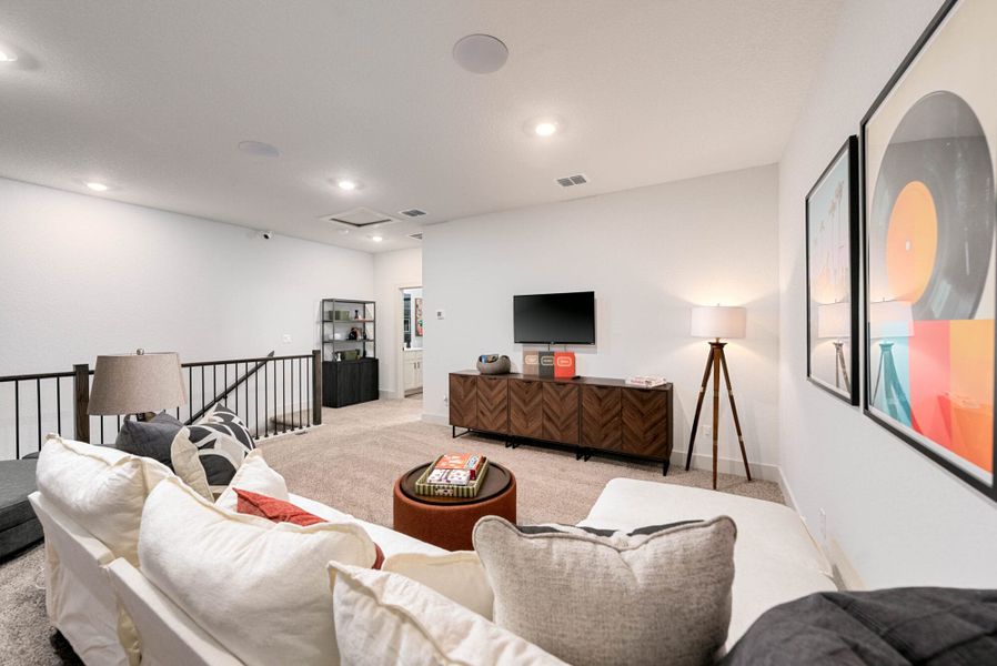 Furnished interior in a model home at Weltner Farms 60’s in New Braunfels (Image 32).