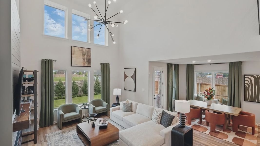 Experience elegance with expansive windows, high ceilings, and a striking chandelier in Westridge.