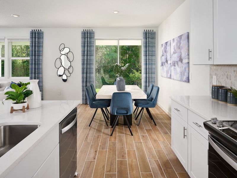 Furnished interior in a model home at Colbert Landings - Signature Series in Palm Coast (Image 10).